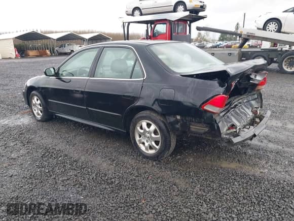 2002 Honda Accord EX with VIN JHMCG66012C018431, listed as a IAAI auction lot 41852093 with 139,665 mi miles and . Bid and sale history available at DreamBid. Image 3.