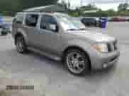 2005 Nissan Pathfinder SE z VIN 5N1AR18U65C747112, wystawiony jako Copart lot #68016305 z przebiegiem 162 033 mil mil oraz Szkoda całkowita • Salvage title. Historia ofert i sprzedaży dostępna na DreamBid. Obrazek 4.
