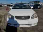 2003 Toyota Corolla LE with VIN 1NXBR32E83Z118296, listed as a Copart auction lot 82462505 with 155,356 mi miles and Salvage title. Bid and sale history available at DreamBid. Image 5.