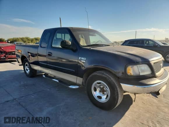 1999 Ford F-150 с VIN 1FTRX17W4XNB72337, выставлен на аукционе Copart как лот 86766575 с пробегом 183 712 миль миль и Чистый • Clean title. История ставок и продаж доступна на DreamBid. Изображение 4.