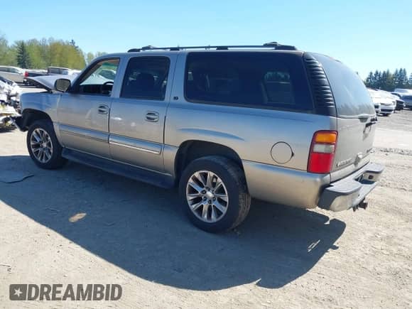 2003 Chevrolet Suburban LT with VIN 3GNEC16Z23G155942, listed as a IAAI auction lot 42077249 with 218,465 mi miles and . Bid and sale history available at DreamBid. Image 3.