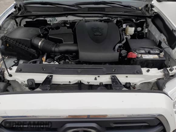 2023 Toyota Tacoma SR z VIN 3TYRZ5CN9PT026979, wystawiony jako Copart lot #85715965 z przebiegiem 70 943 mil mil oraz Szkoda całkowita • Salvage title. Historia ofert i sprzedaży dostępna na DreamBid. Obrazek 11.