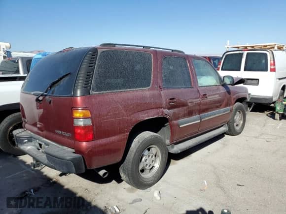 2001 Chevrolet Tahoe LS с VIN 1GNEC13T71R203996, выставлен на аукционе Copart как лот 69393515 с пробегом Не указан миль и На запчасти • Non repairable. История ставок и продаж доступна на DreamBid. Изображение 3.
