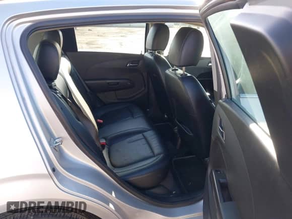 2013 Chevrolet Sonic LTZ with VIN 1G1JE6SB2D4104651, listed as a IAAI auction lot 41803945 with 132,337 mi miles and . Bid and sale history available at DreamBid. Image 8.