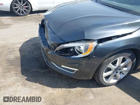 2016 Volvo S60 T5 Drive-E Premier z VIN YV126MFK4G2399690, wystawiony jako IAAI lot #42043307 z przebiegiem 100 647 mil mil oraz . Historia ofert i sprzedaży dostępna na DreamBid. Obrazek 6.