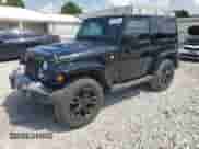 2018 Jeep Wrangler Sahara z VIN 1C4AJWBG5JL884614, wystawiony jako Copart lot #65006085 z przebiegiem 120 752 mil mil oraz Szkoda całkowita • Salvage title. Historia ofert i sprzedaży dostępna na DreamBid. Obrazek 1.