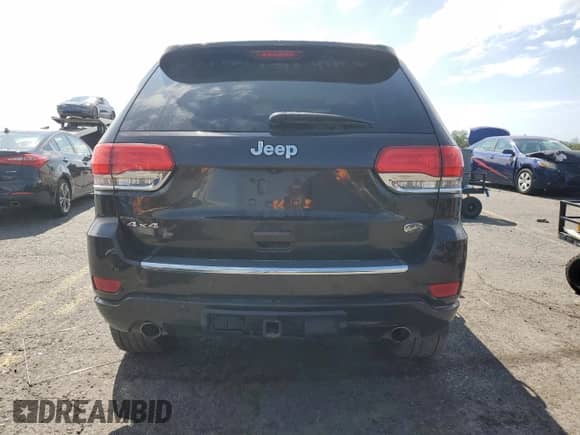 2017 Jeep Grand Cherokee Overland with VIN 1C4RJFCG4HC654896, listed as a Copart auction lot 69584085 with Not provided miles and Salvage title. Bid and sale history available at DreamBid. Image 6.