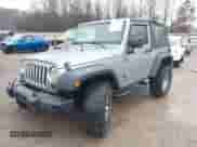 2013 Jeep Wrangler Sport with VIN 1C4AJWAG8DL622334, listed as a IAAI auction lot 41463977 with 153,207 mi miles and . Bid and sale history available at DreamBid. Image 2.