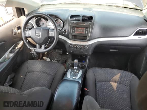 2018 Dodge Journey SE with VIN 3C4PDCABXJT421474, listed as a Copart auction lot 62369305 with 107,554 mi miles and Salvage title. Bid and sale history available at DreamBid. Image 8.