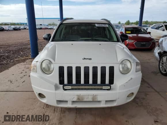 2007 Jeep Compass Sport with VIN 1J8FT47W37D145824, listed as a Copart auction lot 70866745 with 193,992 mi miles and Clean title. Bid and sale history available at DreamBid. Image 5.