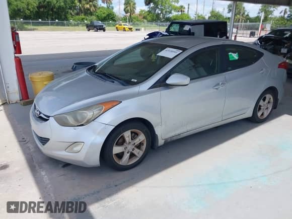 2012 Hyundai Elantra Limited z VIN KMHDH4AEXCU180057, wystawiony jako IAAI lot #42538501 z przebiegiem 150 489 mil mil oraz . Historia ofert i sprzedaży dostępna na DreamBid. Obrazek 2.