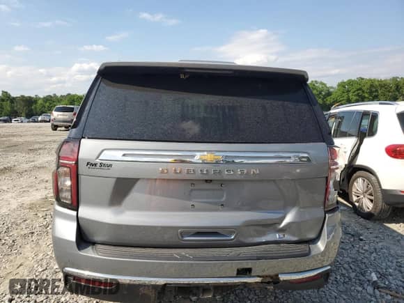 2023 Chevrolet Suburban LT с VIN 1GNSCCKDXPR530328, выставлен на аукционе Copart как лот 54420965 с пробегом 37 996 миль миль и Списание • Salvage title. История ставок и продаж доступна на DreamBid. Изображение 6.