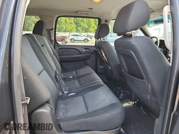 2011 Chevrolet Suburban LS with VIN 1GNSKHE37BR244285, listed as a Copart auction lot 84466945 with 161,342 mi miles and Salvage title. Bid and sale history available at DreamBid. Image 11.
