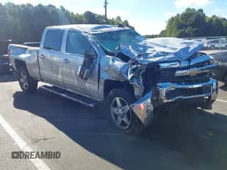 2016 Chevrolet Silverado 2500HD LTZ with VIN 1GC1KWE87GF140795, listed as a IAAI auction lot 43233000 with 311,585 mi miles and . Bid and sale history available at DreamBid. Image 1.