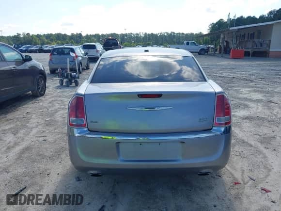 2013 Chrysler 300 with VIN 2C3CCARG0DH605717, listed as a IAAI auction lot 42693394 with 6,213 mi miles and . Bid and sale history available at DreamBid. Image 6.