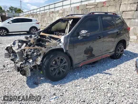 2021 Subaru Forester Special Sports z VIN JF2SKARCXMH521886, wystawiony jako Copart lot #80403935 z przebiegiem Nie podano mil oraz Szkoda całkowita • Salvage title. Historia ofert i sprzedaży dostępna na DreamBid. Obrazek 1.