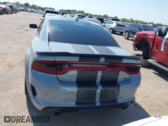 2022 Dodge Charger Scat Pack z VIN 2C3CDXGJ2NH104344, wystawiony jako IAAI lot #43124603 z przebiegiem 53 596 mil mil oraz . Historia ofert i sprzedaży dostępna na DreamBid. Obrazek 16.
