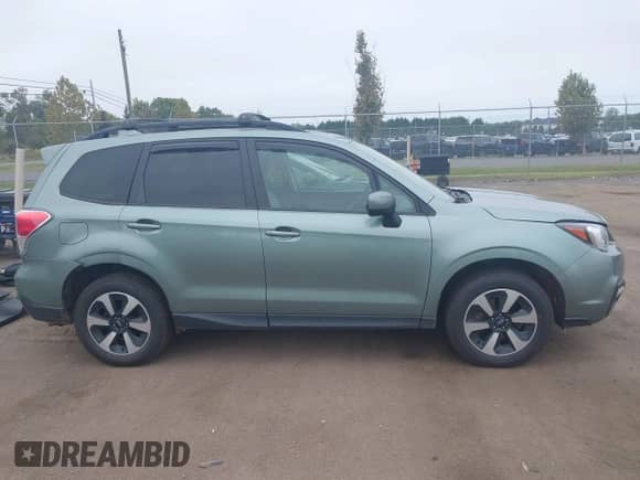 2018 Subaru Forester Premium z VIN JF2SJAEC2JH586302, wystawiony jako IAAI lot #43186549 z przebiegiem 122 233 mil mil oraz . Historia ofert i sprzedaży dostępna na DreamBid. Obrazek 13.