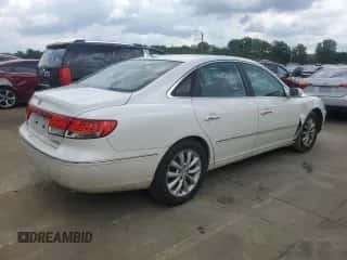 2007 Hyundai Azera SE с VIN KMHFC46F47A216700, выставлен на аукционе Copart как лот 64715524 с пробегом 117 819 миль миль и Списание • Salvage title. История ставок и продаж доступна на DreamBid. Изображение 3.