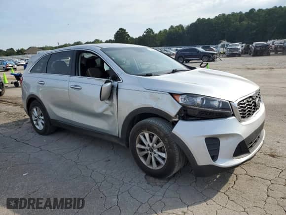 2019 Kia Sorento L with VIN 5XYPG4A35KG472847, listed as a Copart auction lot 70553065 with 168,022 mi miles and Salvage title. Bid and sale history available at DreamBid. Image 4.