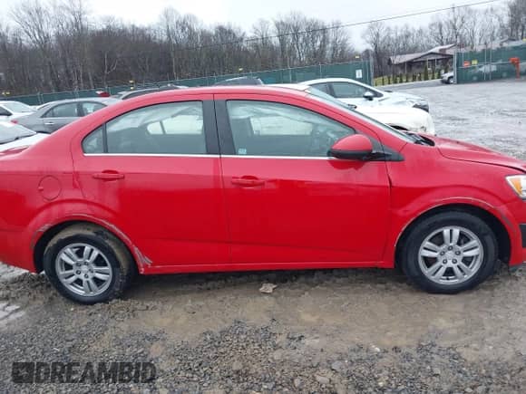 2016 Chevrolet Sonic LT with VIN 1G1JC5SB0G4125907, listed as a IAAI auction lot 41111451 with 95,887 mi miles and . Bid and sale history available at DreamBid. Image 13.