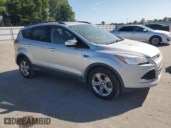 2014 Ford Escape SE z VIN 1FMCU0GX8EUD50363, wystawiony jako Copart lot #85097505 z przebiegiem 119 202 mil mil oraz Szkoda całkowita • Salvage title. Historia ofert i sprzedaży dostępna na DreamBid. Obrazek 4.