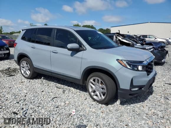 2024 Honda Passport EX-L with VIN 5FNYF8H5XRB018374, listed as a Copart auction lot 60676545 with 30,898 mi miles and Salvage title. Bid and sale history available at DreamBid. Image 4.