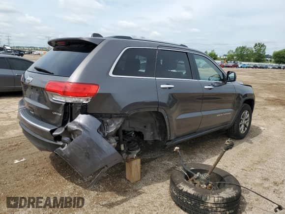 2014 Jeep Grand Cherokee Limited z VIN 1C4RJFBGXEC540625, wystawiony jako Copart lot #63450735 z przebiegiem 127 958 mil mil oraz Szkoda całkowita • Salvage title. Historia ofert i sprzedaży dostępna na DreamBid. Obrazek 3.