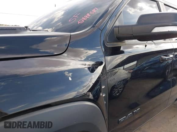 2022 Ram 1500 TRX with VIN 1C6SRFU90NN103186, listed as a IAAI auction lot 42888581 with 53,781 mi miles and . Bid and sale history available at DreamBid. Image 16.