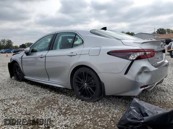 2022 Toyota Camry XSE с VIN 4T1K61AK0NU010021, выставлен на аукционе Copart как лот 82113115 с пробегом 42 900 миль миль и Списание • Salvage title. История ставок и продаж доступна на DreamBid. Изображение 2.
