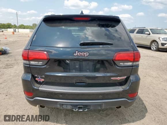2018 Jeep Grand Cherokee Trailhawk с VIN 1C4RJFLG3JC440553, выставлен на аукционе Copart как лот 71740025 с пробегом 68 281 миль миль и Списание • Salvage title. История ставок и продаж доступна на DreamBid. Изображение 6.