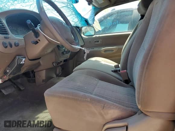 2004 Toyota Tundra SR5 z VIN 5TBBT44114S451895, wystawiony jako Copart lot #62347105 z przebiegiem 59 576 mil mil oraz Szkoda całkowita • Salvage title. Historia ofert i sprzedaży dostępna na DreamBid. Obrazek 7.
