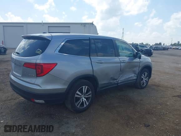 2018 Honda Pilot EX-L z VIN 5FNYF6H52JB023724, wystawiony jako IAAI lot #42812569 z przebiegiem 74 197 mil mil oraz . Historia ofert i sprzedaży dostępna na DreamBid. Obrazek 4.