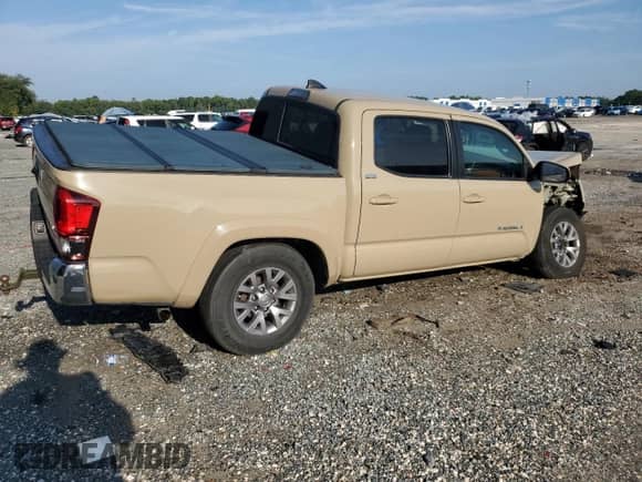 2018 Toyota Tacoma SR with VIN 3TMCZ5AN9JM177204, listed as a Copart auction lot 70188765 with 59,457 mi miles and Salvage title. Bid and sale history available at DreamBid. Image 3.