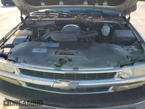 2004 Chevrolet Suburban LT z VIN 3GNEC16T64G325135, wystawiony jako Copart lot #76464374 z przebiegiem 233 083 mil mil oraz Czysty tytuł • Clean title. Historia ofert i sprzedaży dostępna na DreamBid. Obrazek 12.