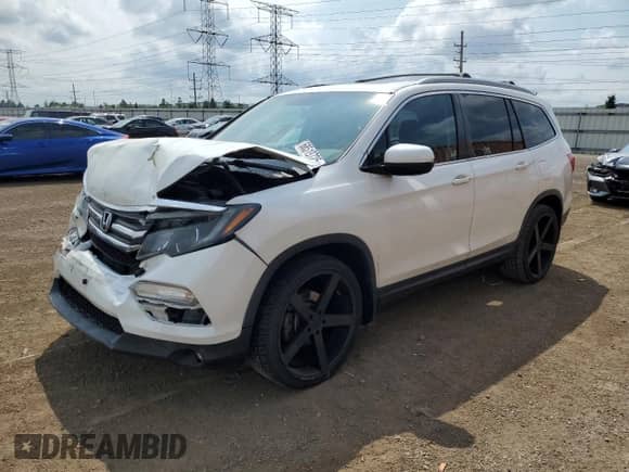 2017 Honda Pilot EX-L with VIN 5FNYF5H82HB004086, listed as a Copart auction lot 68519725 with 135,291 mi miles and Salvage title. Bid and sale history available at DreamBid. Image 1.
