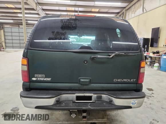 2003 Chevrolet Tahoe LT with VIN 1GNEC13Z63J118959, listed as a Copart auction lot 70187115 with 201,611 mi miles and Salvage title. Bid and sale history available at DreamBid. Image 6.