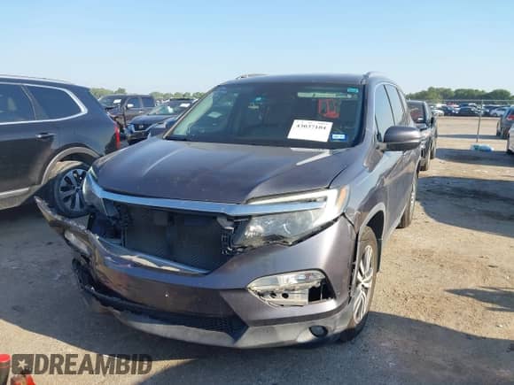 2017 Honda Pilot EX-L with VIN 5FNYF5H67HB030603, listed as a IAAI auction lot 43037104 with 94,827 mi miles and . Bid and sale history available at DreamBid. Image 2.