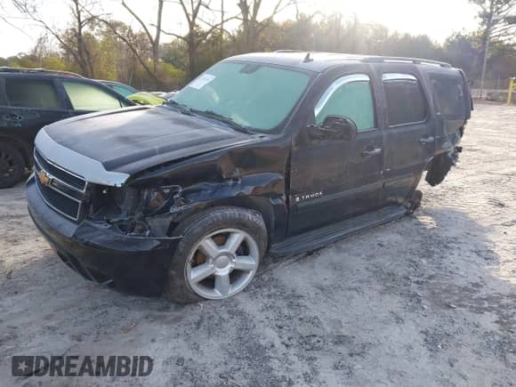 2007 Chevrolet Tahoe LT z VIN 1GNFK13027R262475, wystawiony jako IAAI lot #41595591 z przebiegiem 264 556 mil mil oraz . Historia ofert i sprzedaży dostępna na DreamBid. Obrazek 2.