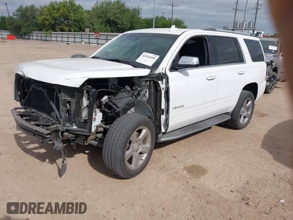 2017 Chevrolet Tahoe Premier z VIN 1GNSCCKC8HR255664, wystawiony jako IAAI lot #42020480 z przebiegiem 97 968 mil mil oraz . Historia ofert i sprzedaży dostępna na DreamBid. Obrazek 23.
