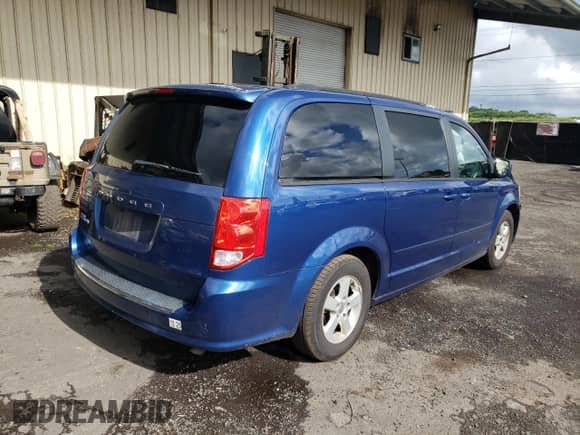 2011 Dodge Grand Caravan Mainstreet with VIN 2D4RN3DG3BR607121, listed as a Copart auction lot 69323525 with 167,229 mi miles and Salvage title. Bid and sale history available at DreamBid. Image 3.