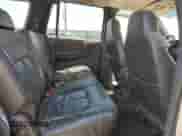 1999 Dodge Durango with VIN 1B4HS28Z1XF582089, listed as a Copart auction lot 63106345 with 172,253 mi miles and Salvage title. Bid and sale history available at DreamBid. Image 11.