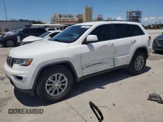 2021 Jeep Grand Cherokee Laredo E with VIN 1C4RJEAG9MC682295, listed as a Copart auction lot 65734825 with 111,495 mi miles and Salvage title. Bid and sale history available at DreamBid. Image 1.
