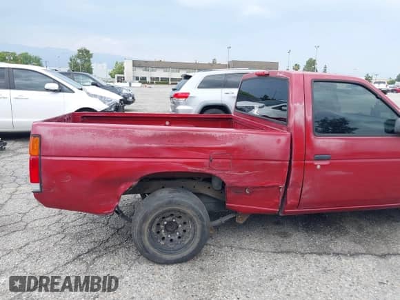 1994 Nissan Frontier with VIN 1N6SD11S3RC356695, listed as a IAAI auction lot 42408659 with 187,376 mi miles and . Bid and sale history available at DreamBid. Image 6.