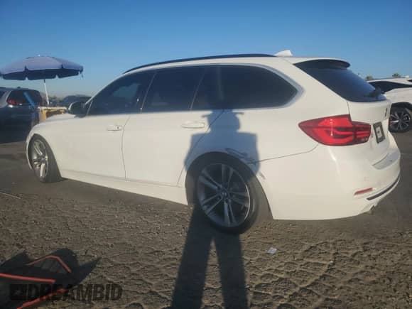 2016 BMW 3 Series 328d xDrive with VIN WBA8J1C51GK458428, listed as a Copart auction lot 77397154 with 109,356 mi miles and Salvage title. Bid and sale history available at DreamBid. Image 2.