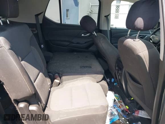 2020 Chevrolet Traverse LS z VIN 1GNERFKW4LJ279328, wystawiony jako IAAI lot #43182524 z przebiegiem 75 612 mil mil oraz . Historia ofert i sprzedaży dostępna na DreamBid. Obrazek 8.