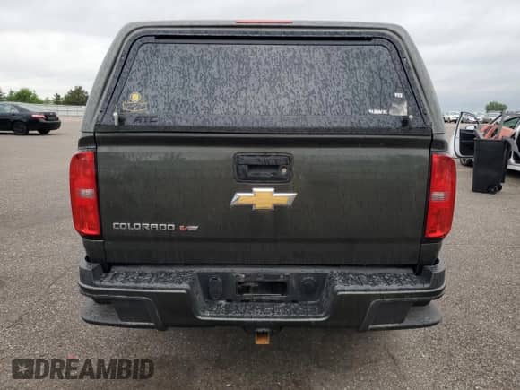 2018 Chevrolet Colorado 4WD Work Truck with VIN 1GCGTBEN5J1155161, listed as a Copart auction lot 65141745 with 164,313 mi miles and Salvage title. Bid and sale history available at DreamBid. Image 6.