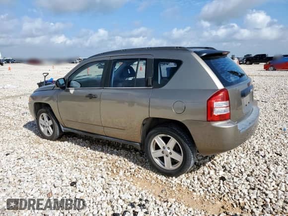 2007 Jeep Compass Sport with VIN 1J8FT47W67D196394, listed as a Copart auction lot 63384155 with 197,387 mi miles and Clean title. Bid and sale history available at DreamBid. Image 2.