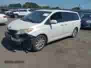 2011 Toyota Sienna XLE AAS with VIN 5TDYK3DC6BS124650, listed as a IAAI auction lot 42695739 with 231,809 mi miles and . Bid and sale history available at DreamBid. Image 2.
