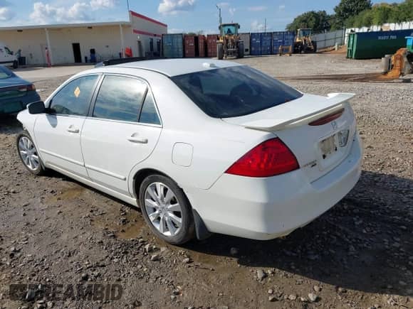 2007 Honda Accord EX-L with VIN 1HGCM66557A009032, listed as a IAAI auction lot 43389400 with 244,444 mi miles and . Bid and sale history available at DreamBid. Image 3.